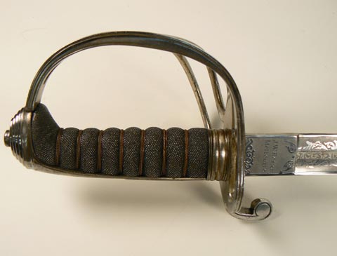 Close up of the hilt of the sword. The name 'JW Rosier' is visible.