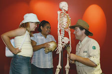 Tim the Yowie Man with Iesha Thompson and Claire Hubbard.