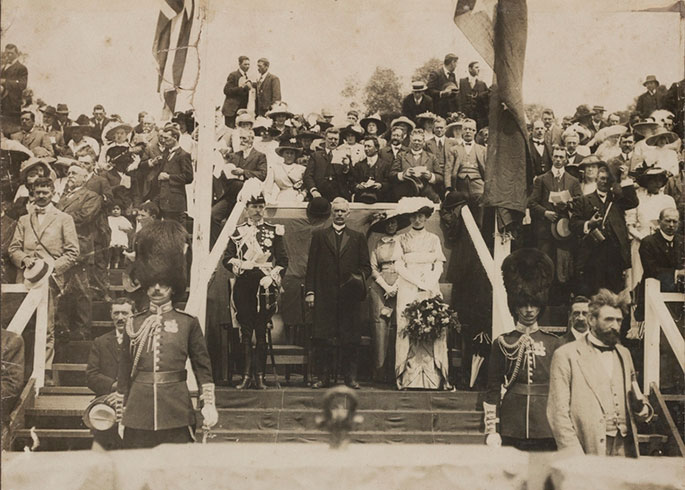 Black and white photograph of dignatories and people at the official ceremony to make the commencement of work on the city of Canberra