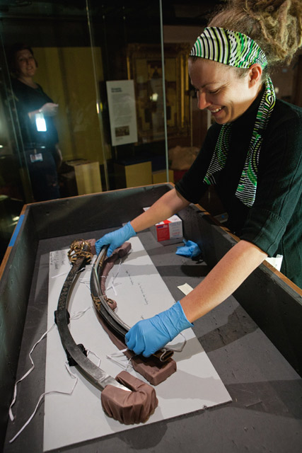 Installing Governor Lachlan Macquarie's sword in the Landmarks gallery.