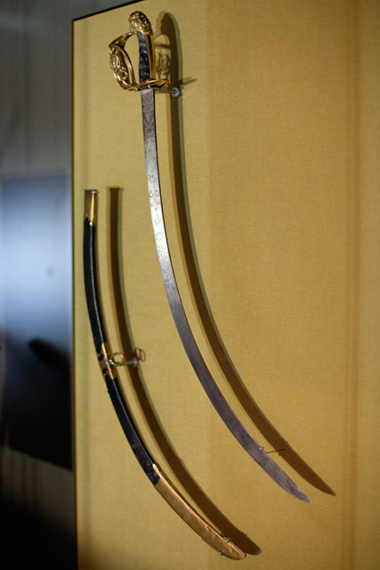 Installing Governor Lachlan Macquarie's sword in the Landmarks gallery.