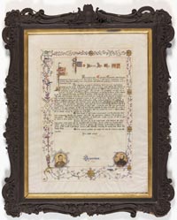 A framed manuscript, written in black ink and coloured paints recognising Ambrose Kyte's support of the Victorian Exploring Expedition.