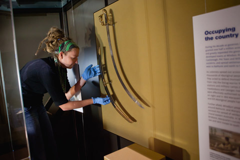 Installing Governor Lachlan Macquarie's sword in the Landmarks gallery.