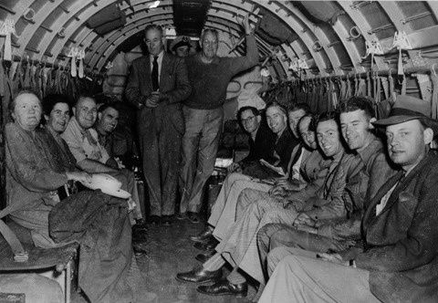 Expedition members aboard the RAAF Dakota aircraft travelling from Adelaide to Darwin, March 1948.