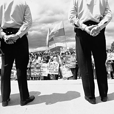 a black and white photo in the 1970s of a protest
