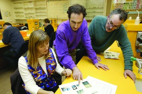 The Museum's Roger Garland (centre) teaches Museum Studies to students at the Canberra Institute of Technology