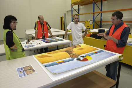 Registration manager Carol Cooper, Museum conservators Peter Bucke and David Parker discuss the triage operation with Conservation Manager Eric Archer.