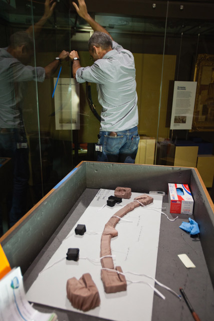 Installing Governor Lachlan Macquarie's sword in the Landmarks gallery.
