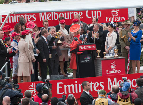 Governor-General Quentin Bryce presents the 2010 Melbourne Cup trophy to winning owners Gerry Ryan, Kevin Bamford and Colleen Bamford.
