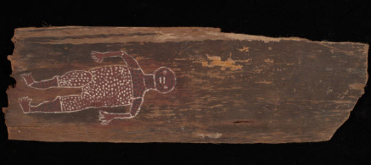 Painting on rough bark depicting a figure with its arm held out.