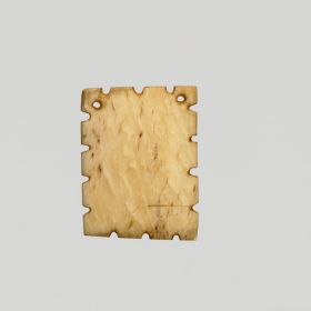 A flat square bone pendant with half notches on all sides and perforated at the corners.