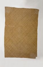 A piece of very fine matting made of light brown plantain leaf fibres.