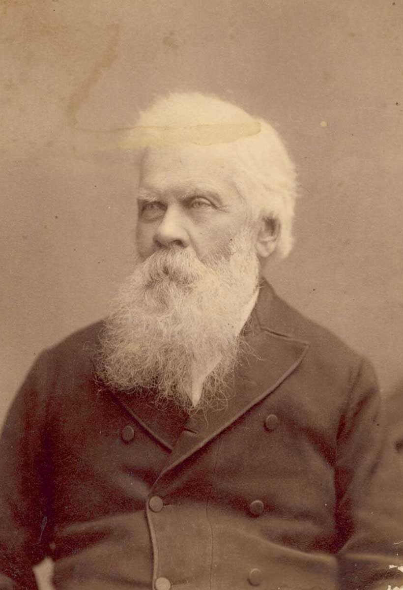 Studio photographic portrait of older man, with white hair and long white beard. - click to view larger image
