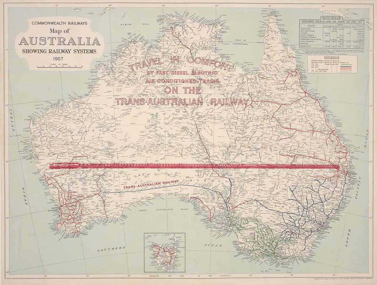 Map of Australia with a red stylised image of a train stretching from the east to west coasts. Printed over the top-end are the words ‘Travel in comfort by fast diesel electric air conditioned trains on the Trans-Australian Railway.
