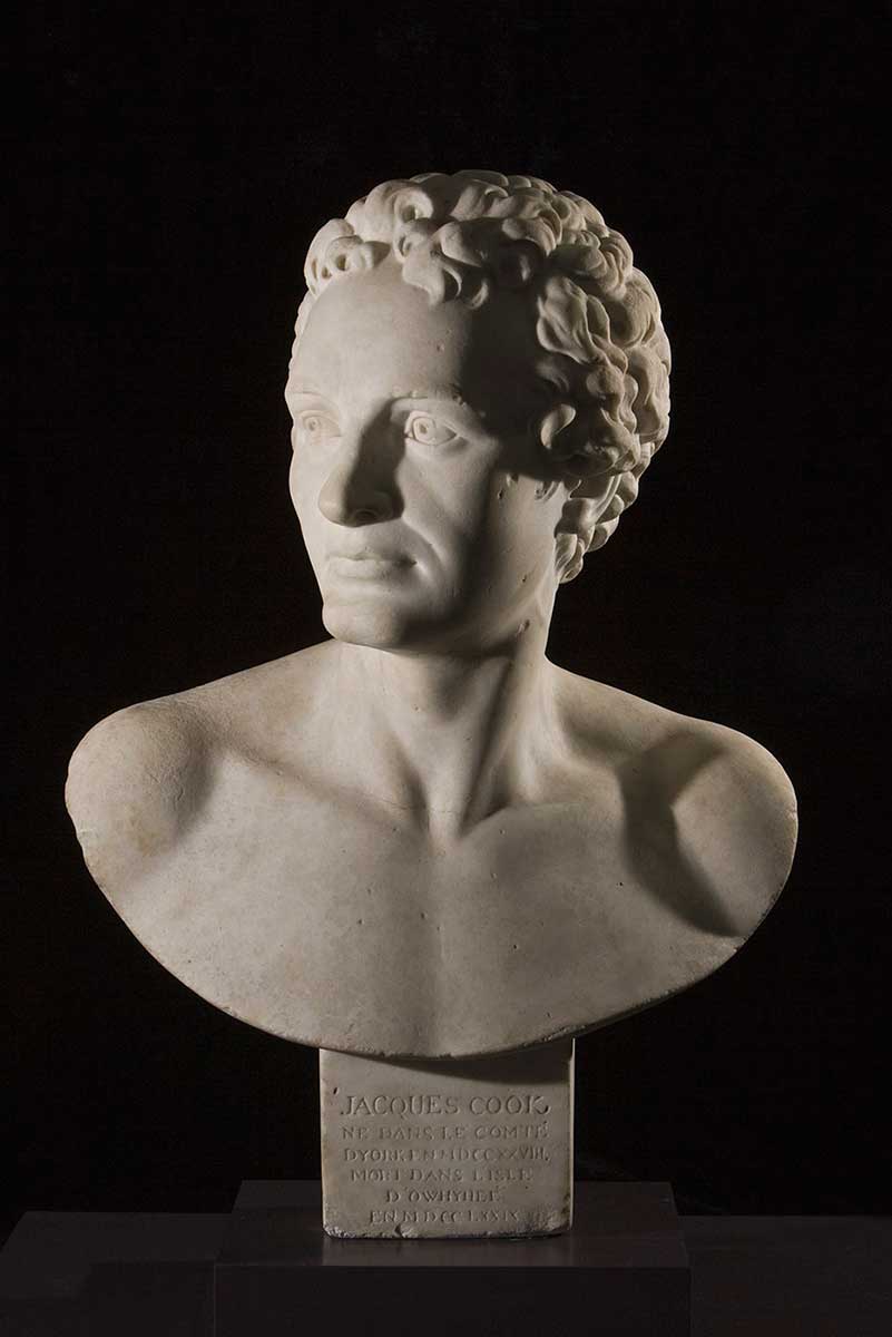 White bust of Cook against a blue background. Cook is shirtless and hatless with curled hair, in the manner of an ancient Greek hero - click to view larger image