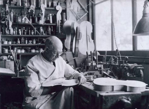 AE Smith in his workshop at home, about 1954. - click to view larger image