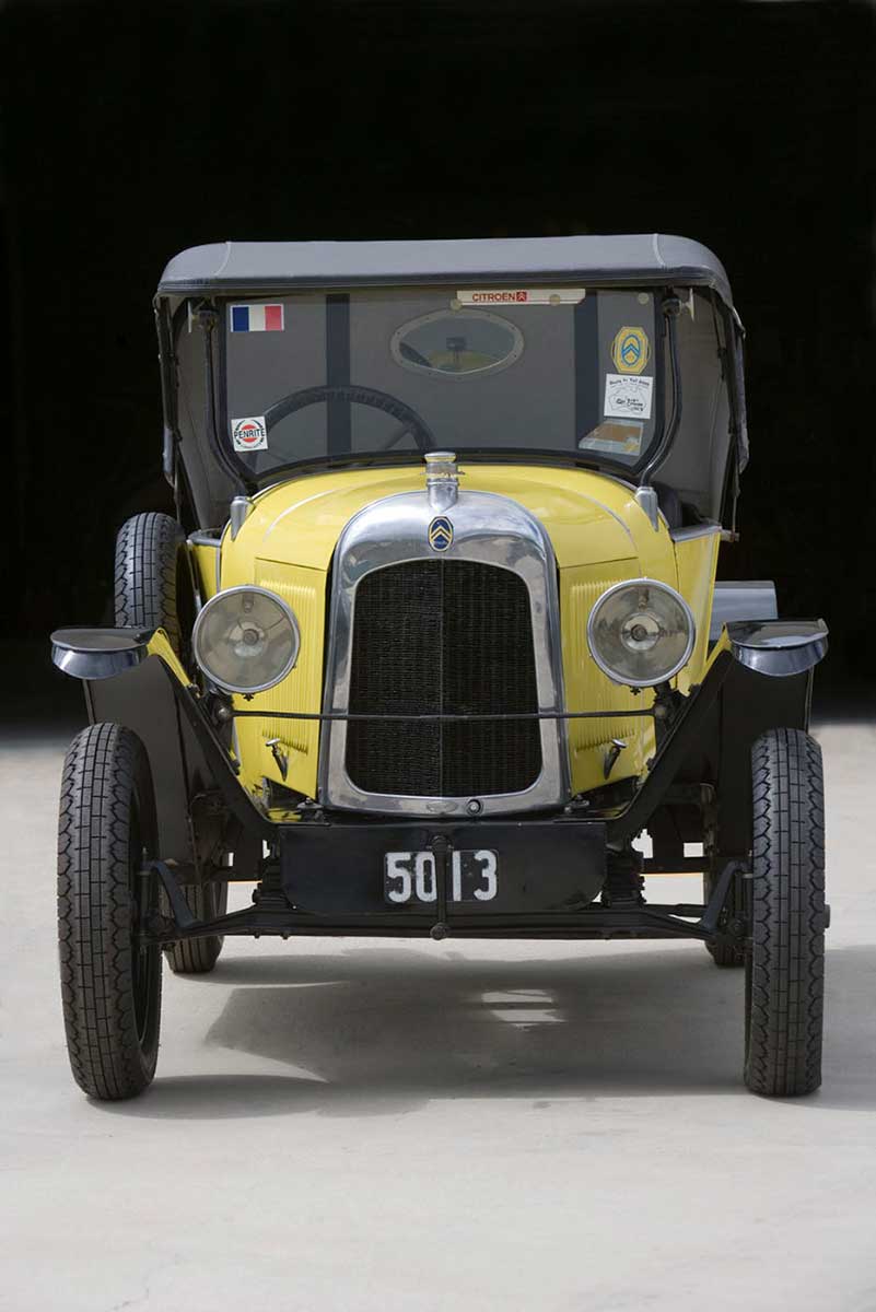 Front view of yellow and black Citroen car. - click to view larger image