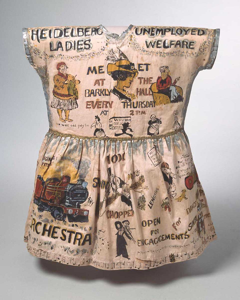Girl's fancy dress garment, hand-painted with cartoons and caricatures showing the work of the Heidelberg Unemployment Bureau. - click to view larger image