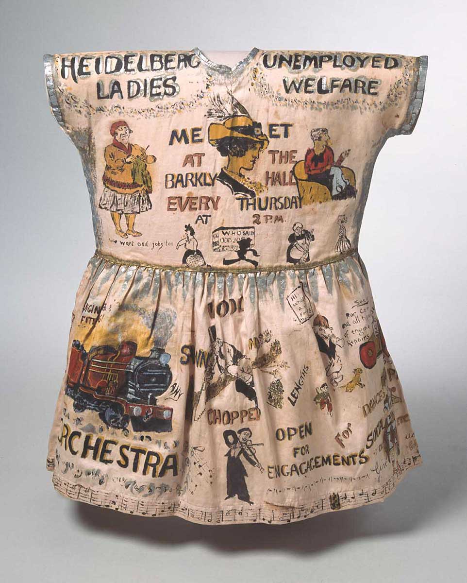 Girl's fancy dress garment, hand-painted with cartoons and caricatures showing the work of the Heidelberg Unemployment Bureau.