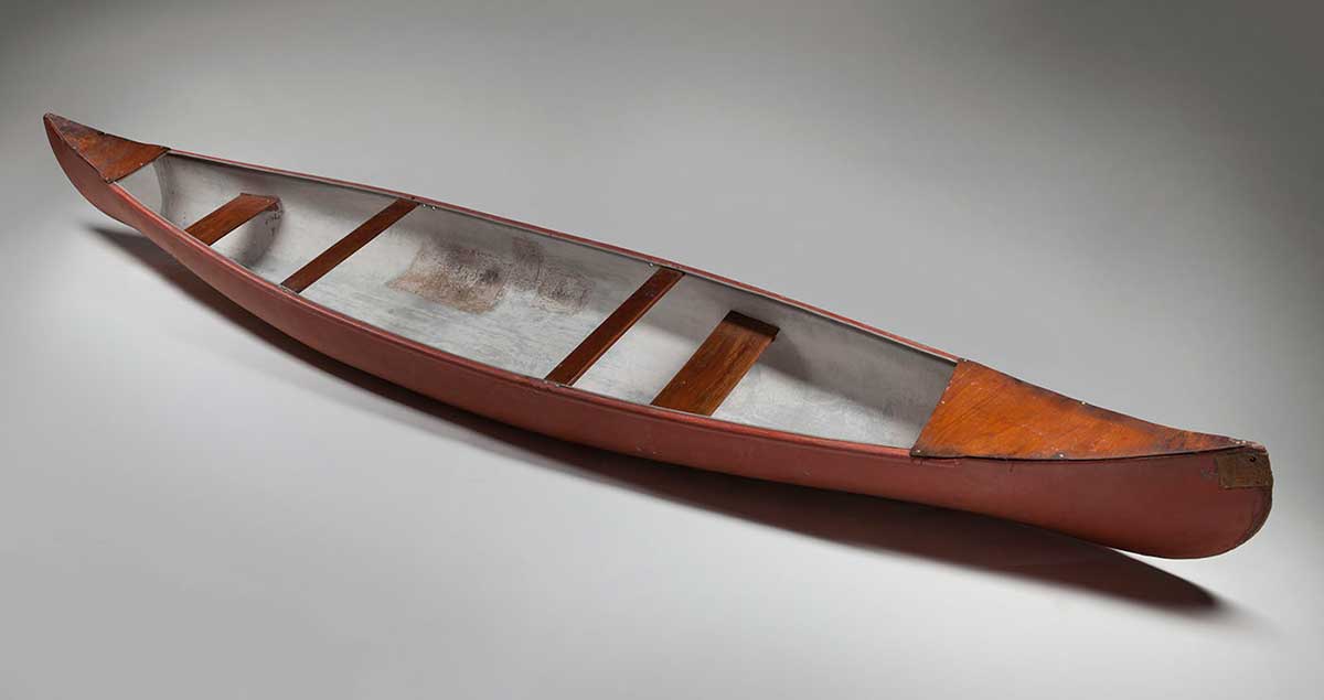 A canoe with worn surfaces.