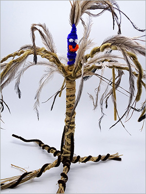 A woven artwork piece made from plant and man-made materials