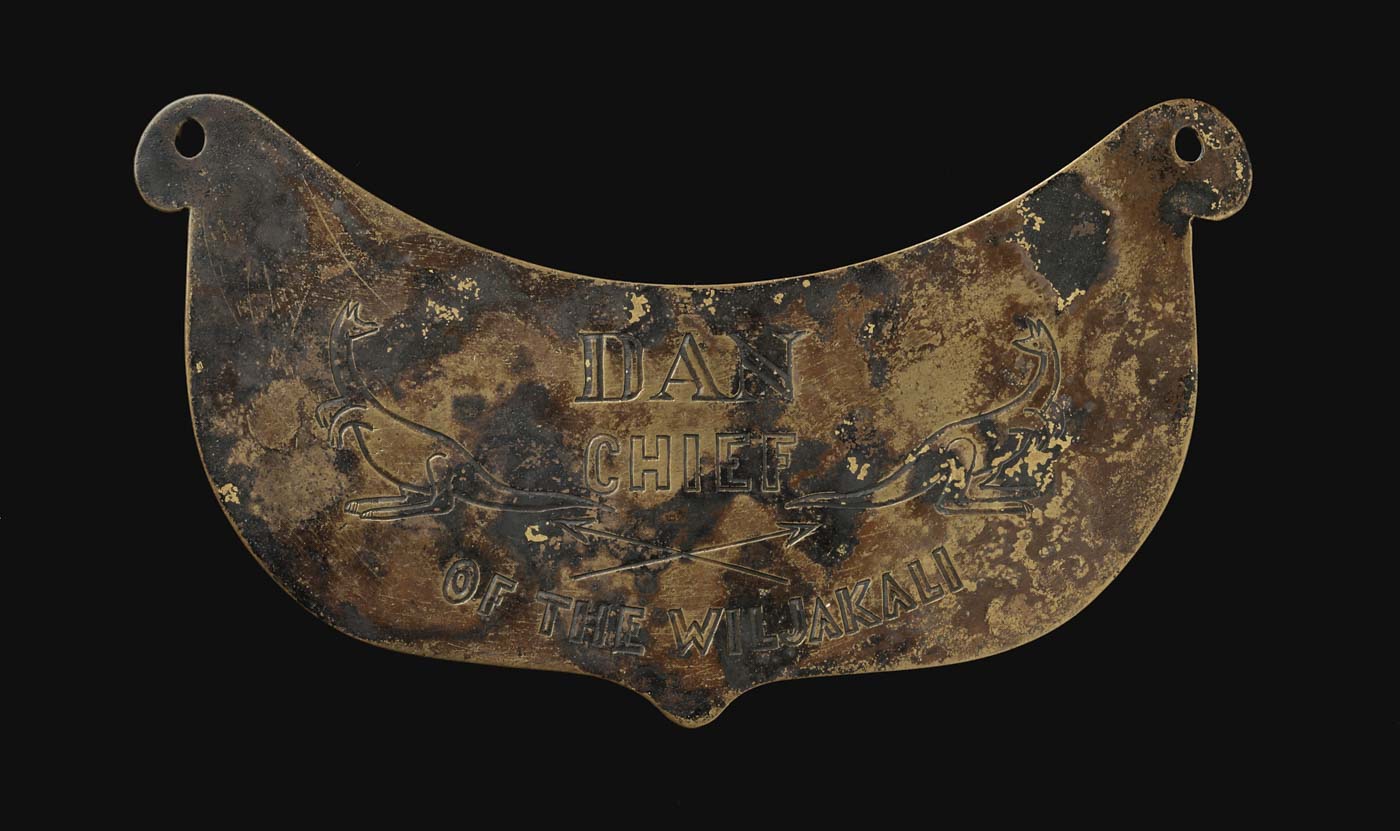 Engraved breastplate with images of a kangaroo and emu. - click to view larger image