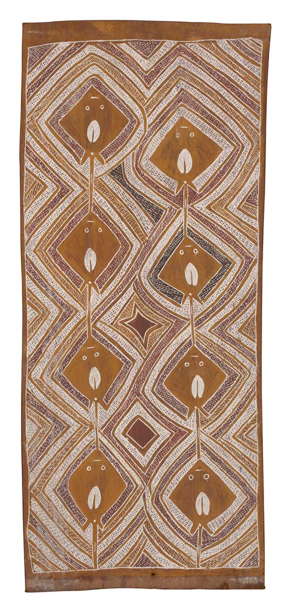 A bark painting worked with ochres on bark. It depicts two vertical rows of four stingrays painted in yellow. Around these are diamond shaped patterns in yellow and white crosshatching. The painting has yellow borders at either end. - click to view larger image