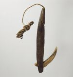 Fishhook with wooden shank, inserted bone point, and twisted cord as the line.