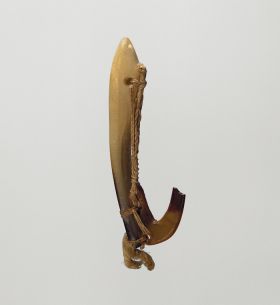 Fishhook with mother-of-pearl shank, the hook made of tortoiseshell, both secured together with plaited cord of plant fibre to form the line.