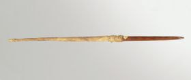 Wand made of pointed wood which is coated with the skin of a dog’s tail.