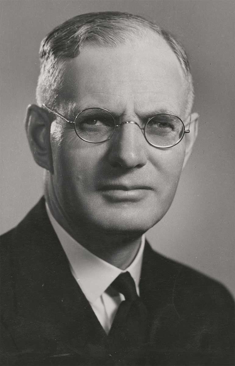 portrait photograph of a middle aged man with glasses - click to view larger image