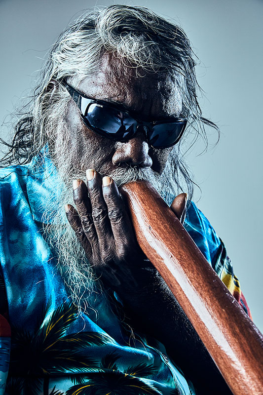 Studio portrait photograph of Mr Gurruwiwi. - click to view larger image