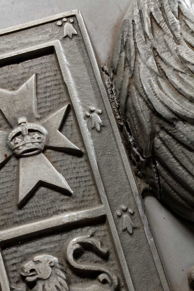 Detail of a damaged Australian coat of arms. - click to view larger image