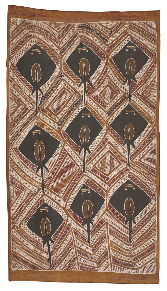 A bark painting worked with ochres on bark. It depicts three rows each of three black stingrays. These are surrounded by diamond shaped yellow bars and crosshatching. The painting has a yellow border. - click to view larger image