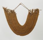 Horseshoe-shaped, collar-like breast ornament or gorget consisting of lattice-work made of some cane slips held together by twisted plant fibre strings.