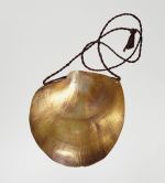 One piece of a two-piece neck ornament consisting of two mother-of-pearl mussel shells. Each with its own neckband.