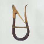 U-shaped wooden hook made with whale sinew and an inward pointing barbed bone tied to the hook with root splits.