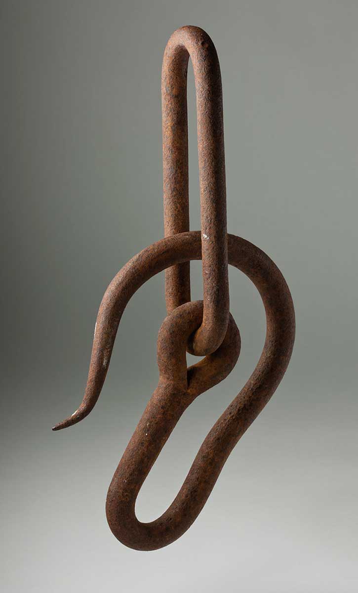 Rusted metal hook. - click to view larger image