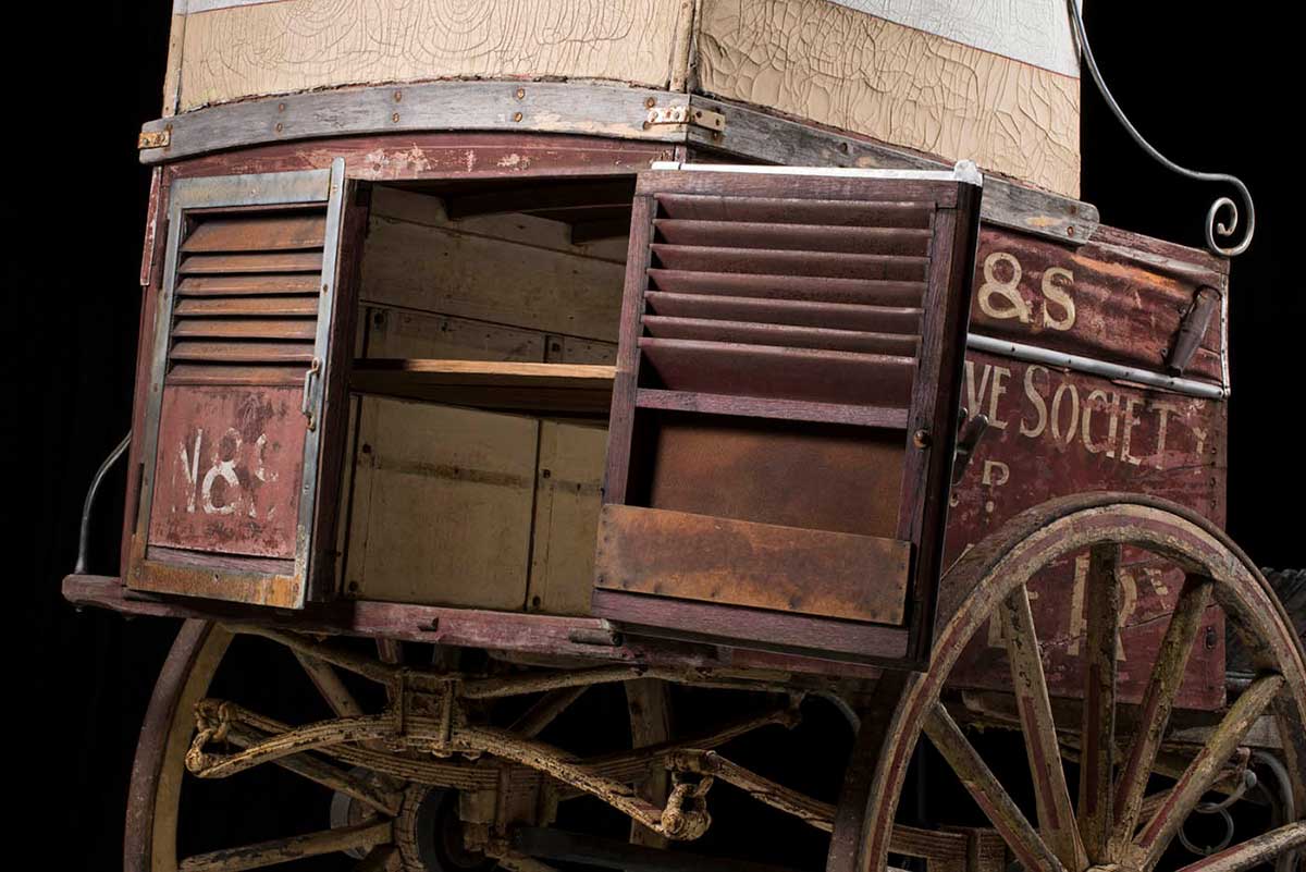 Detail of an old bakery cart revealing the interior from the back. - click to view larger image