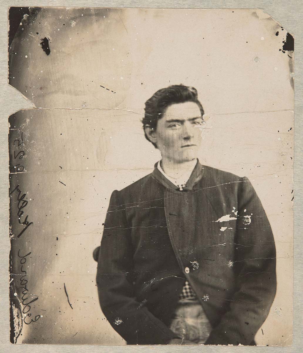 Photo of a young man taken from waist up. - click to view larger image