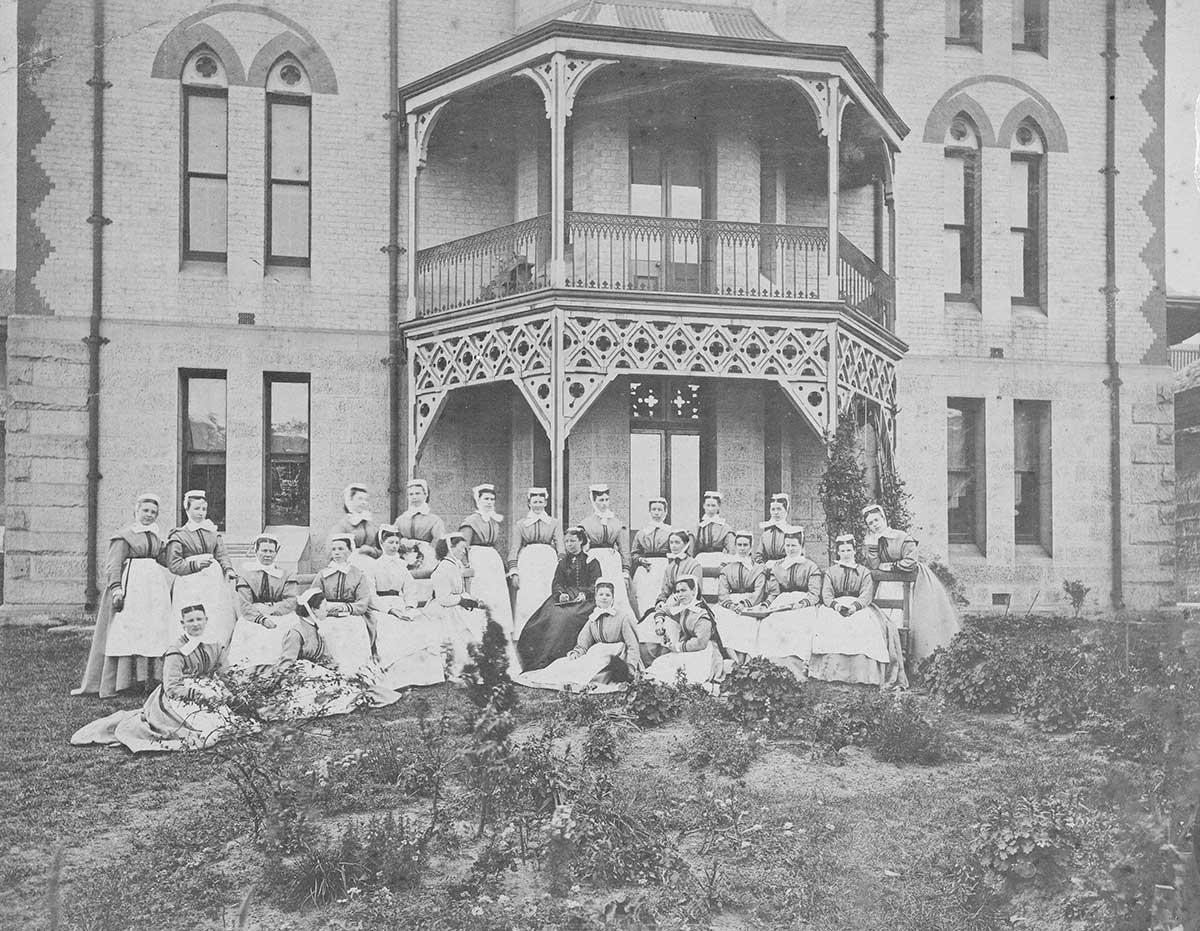 Nurses sitting outside of Sydney hospital. - click to view larger image