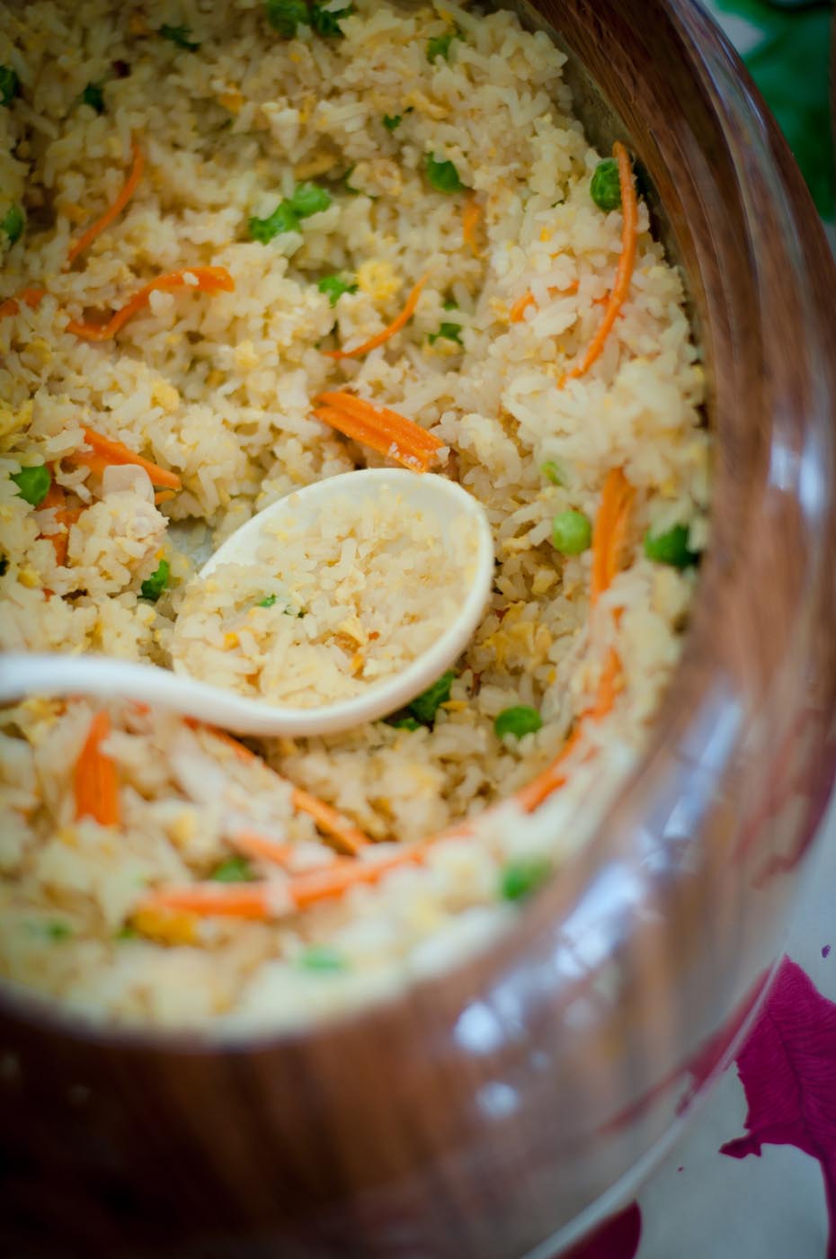 Photo showing a detail view of fried rice with peas and carrot slivers visible amongst the egg and rice - click to view larger image