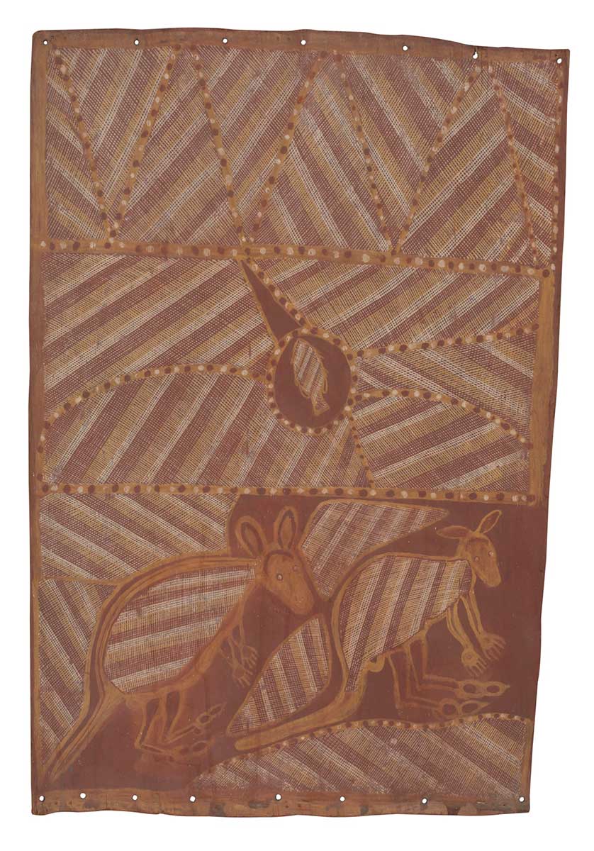 A bark painting worked with ochres on bark. It depicts two figures with crosshatching on their bodies. The larger figure on the right has a black nose and large semi circle for a mouth. The smaller figure in the top left hand corner has white eyes painted on a red head. - click to view larger image