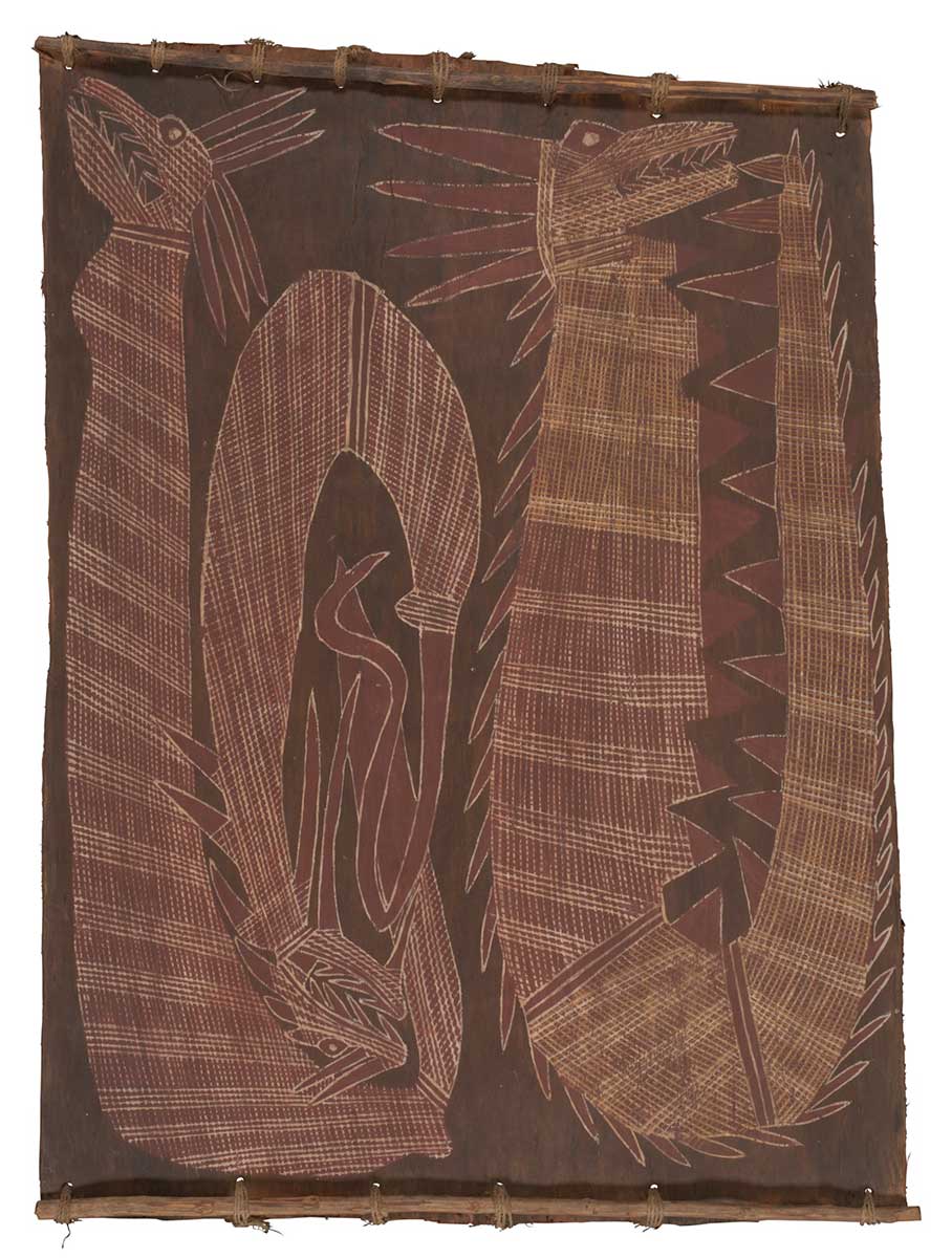 A bark painting worked with ochres on bark and on wooden restraienrs. It depicts three serpents with spikes and red and white crosshatching. The serpents are shown arranged in u-shapes. The painting has a brown background. - click to view larger image