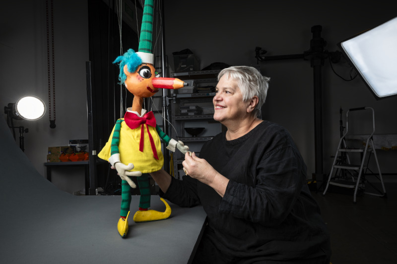 A photograph of Rebecca Hetherington with Mr Squiggle