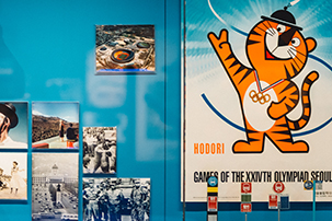 A Korean poster for the Korean winter Olympic games featuring a cartoon tiger.