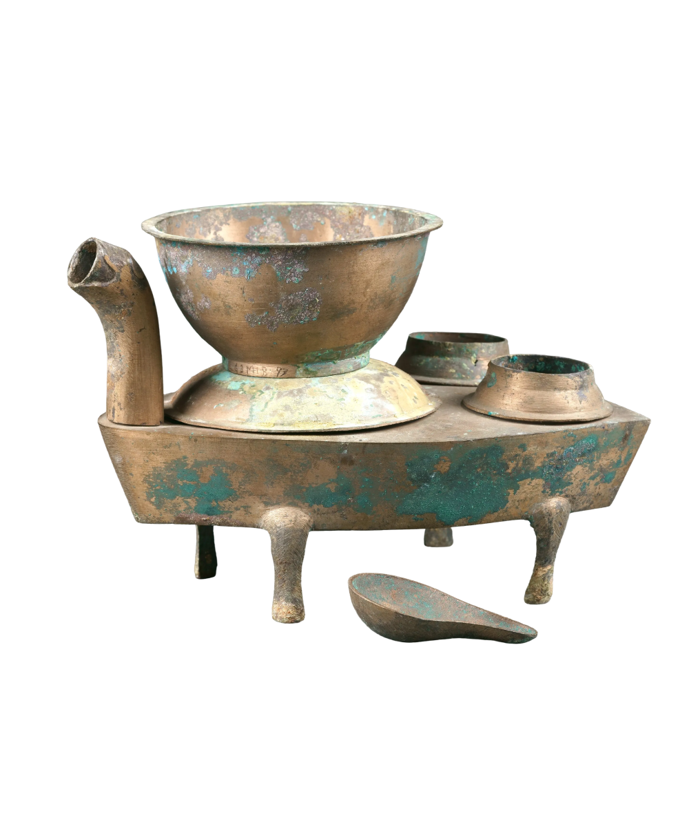 A miniature bronze stove