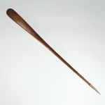 Club made of reddish-brown wood