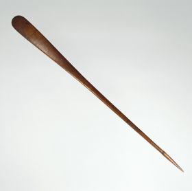 Club made of reddish-brown wood