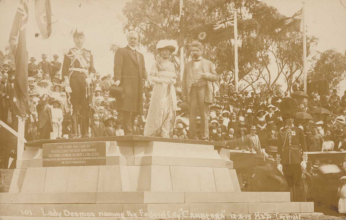 Black and white photograph of dignatories and people at the official ceremony to make the commencement of work on the city of Canberra